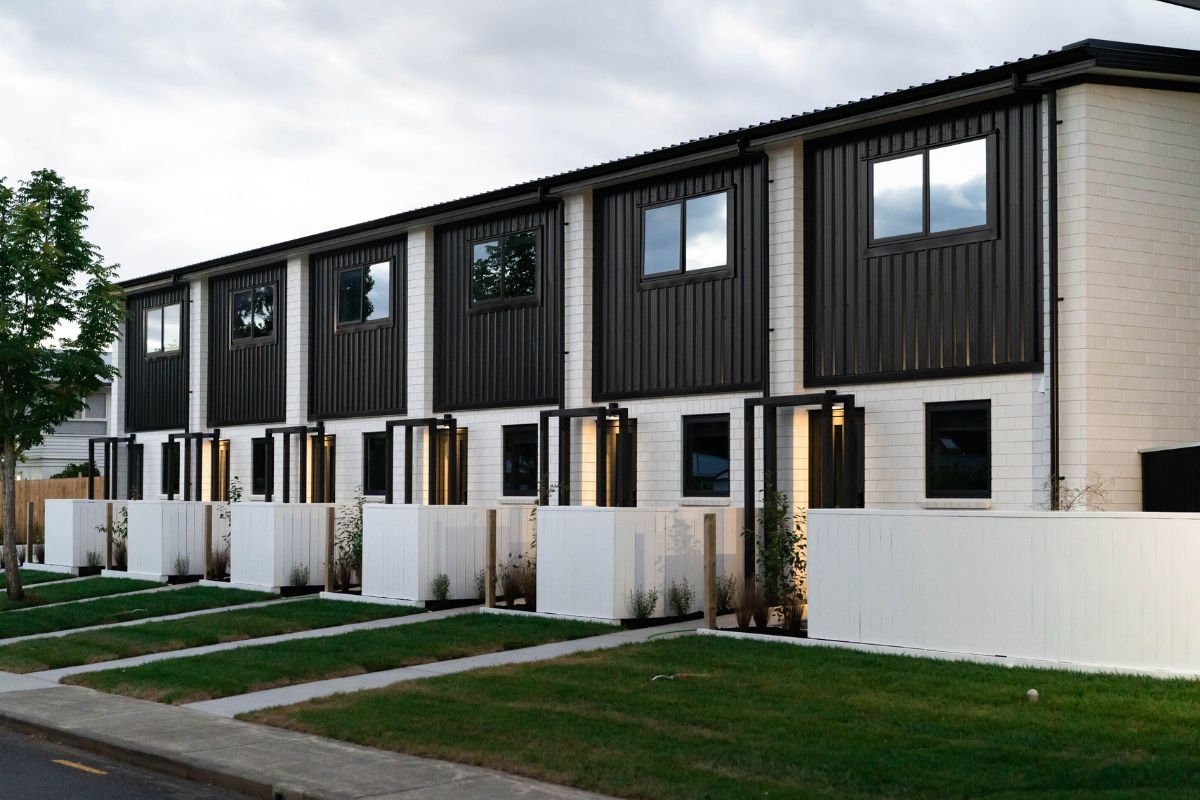 Shared garden strip beside a row of townhouses